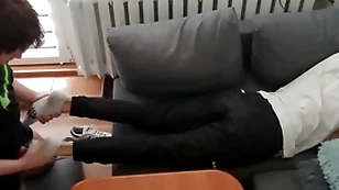 Young suppliant pays out his bills close to his paws